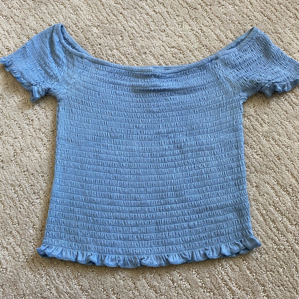 Robbed blue cropped off the shoulder